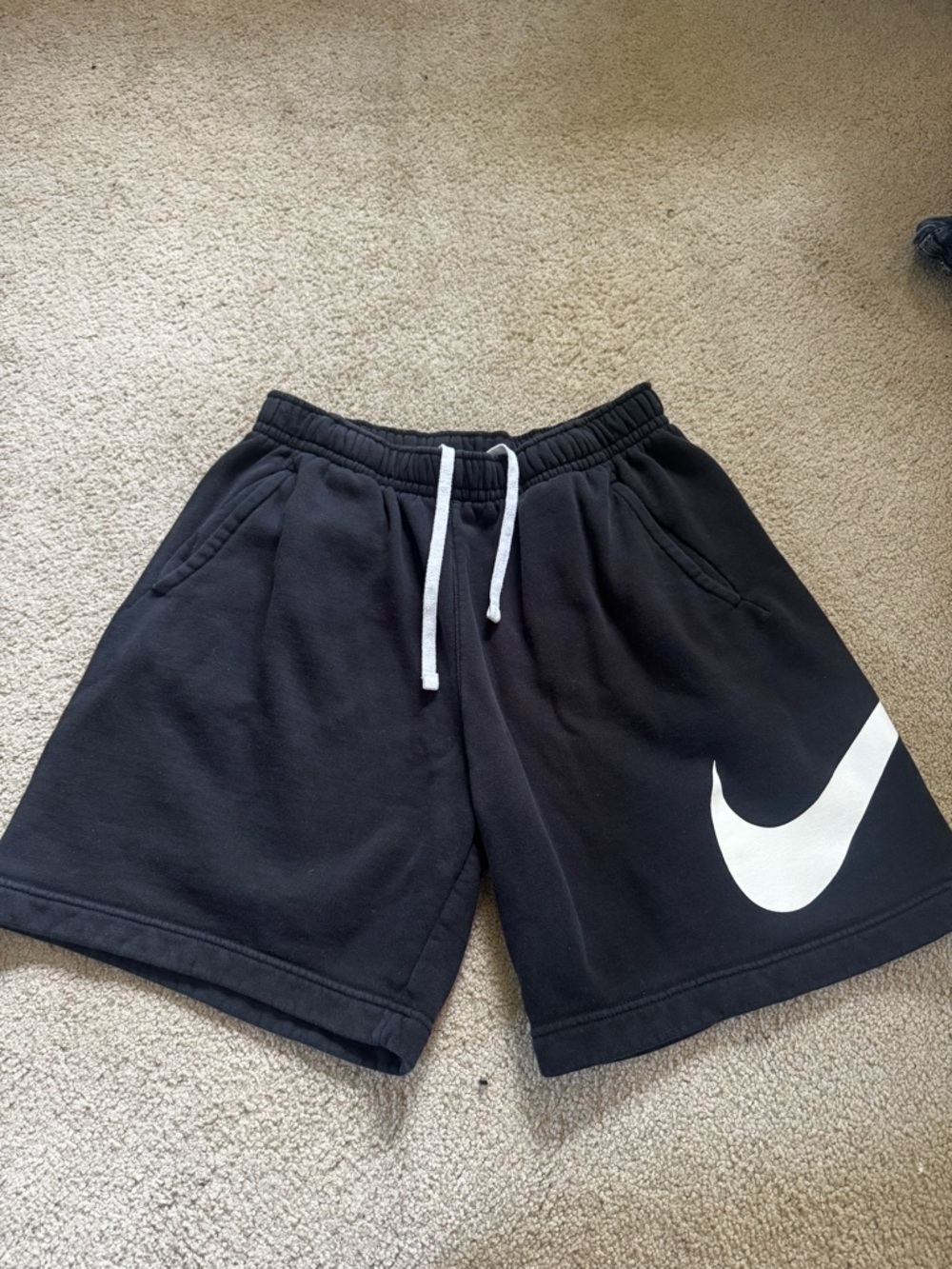 Nike Black Fleece Shorts with White Drawstring and Swoosh